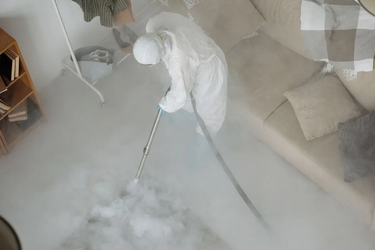 Biohazard cleanup technician in protective equipment, Southwest Schuylkill, Philadelphia, PA